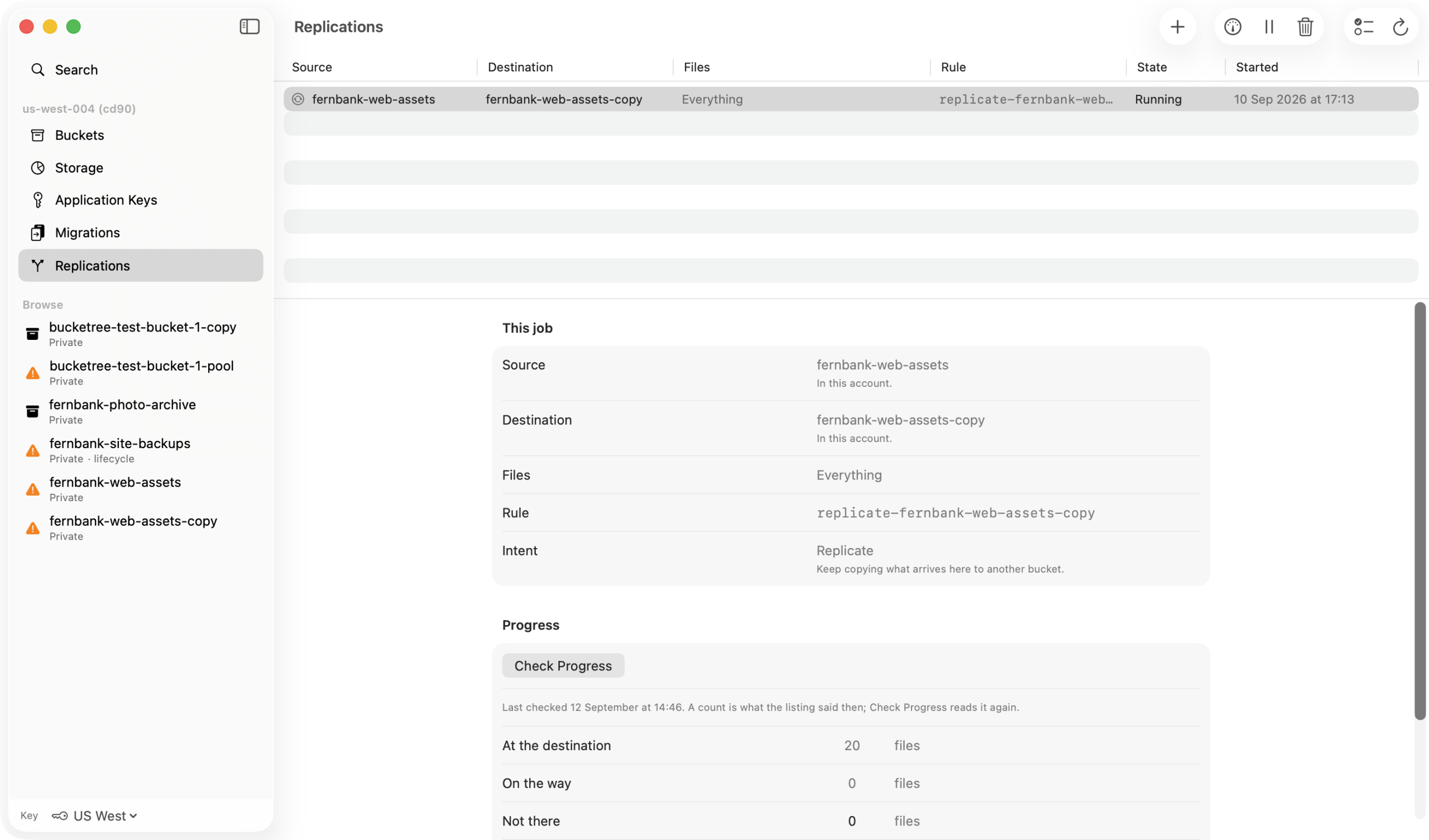 A replication job in the Replications pane, with its detail below.